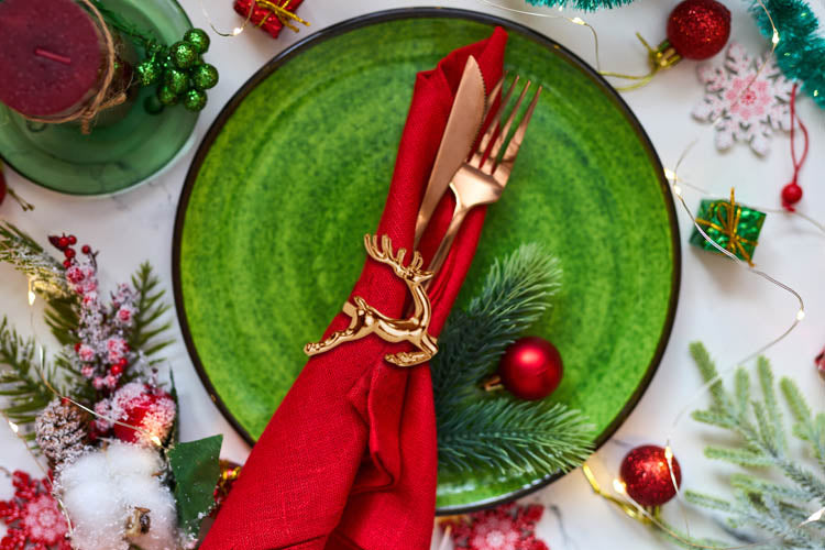 Obrączka na serwetki złote Renifery