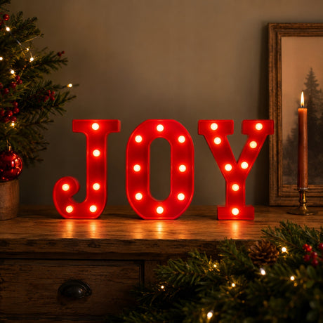 Świecący napis JOY LED z ciepłym białym światłem